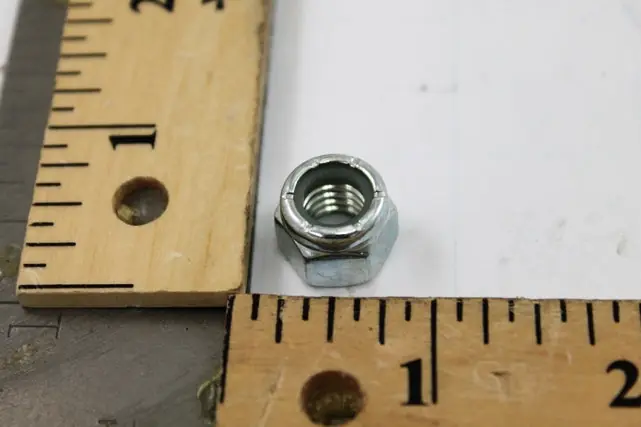 SK0406362-US20260702-105043-0 Trane NUT0150 Self Locking Hex Cap Nut HVAC and Industrial Applications Replacement Part - Image 1